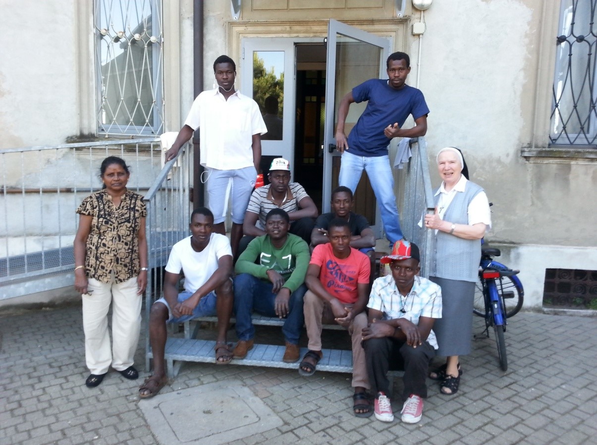 q2106 volti migranti02